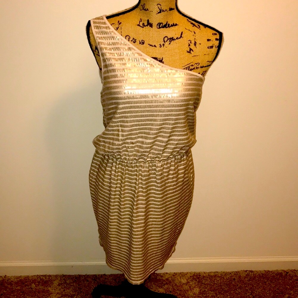 Gold Sequin one shoulder dress.
